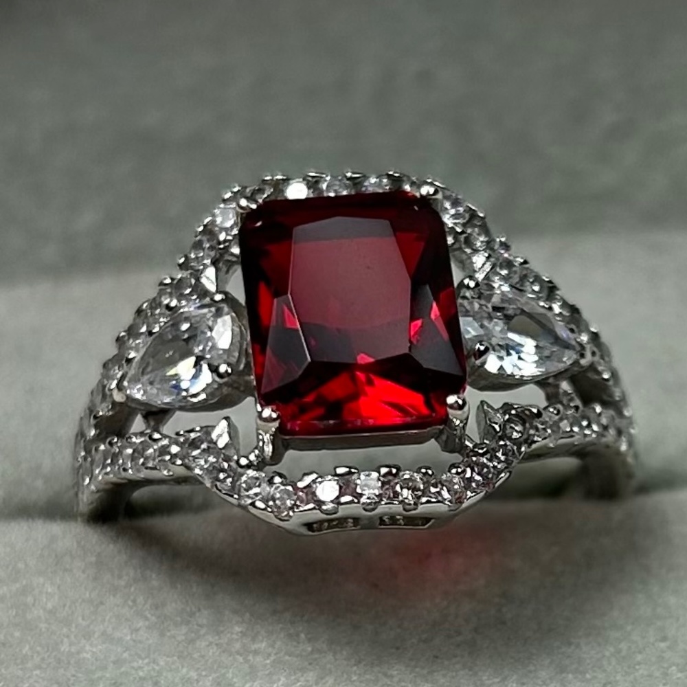 Sterling silver lab created Ruby n white topaz ring